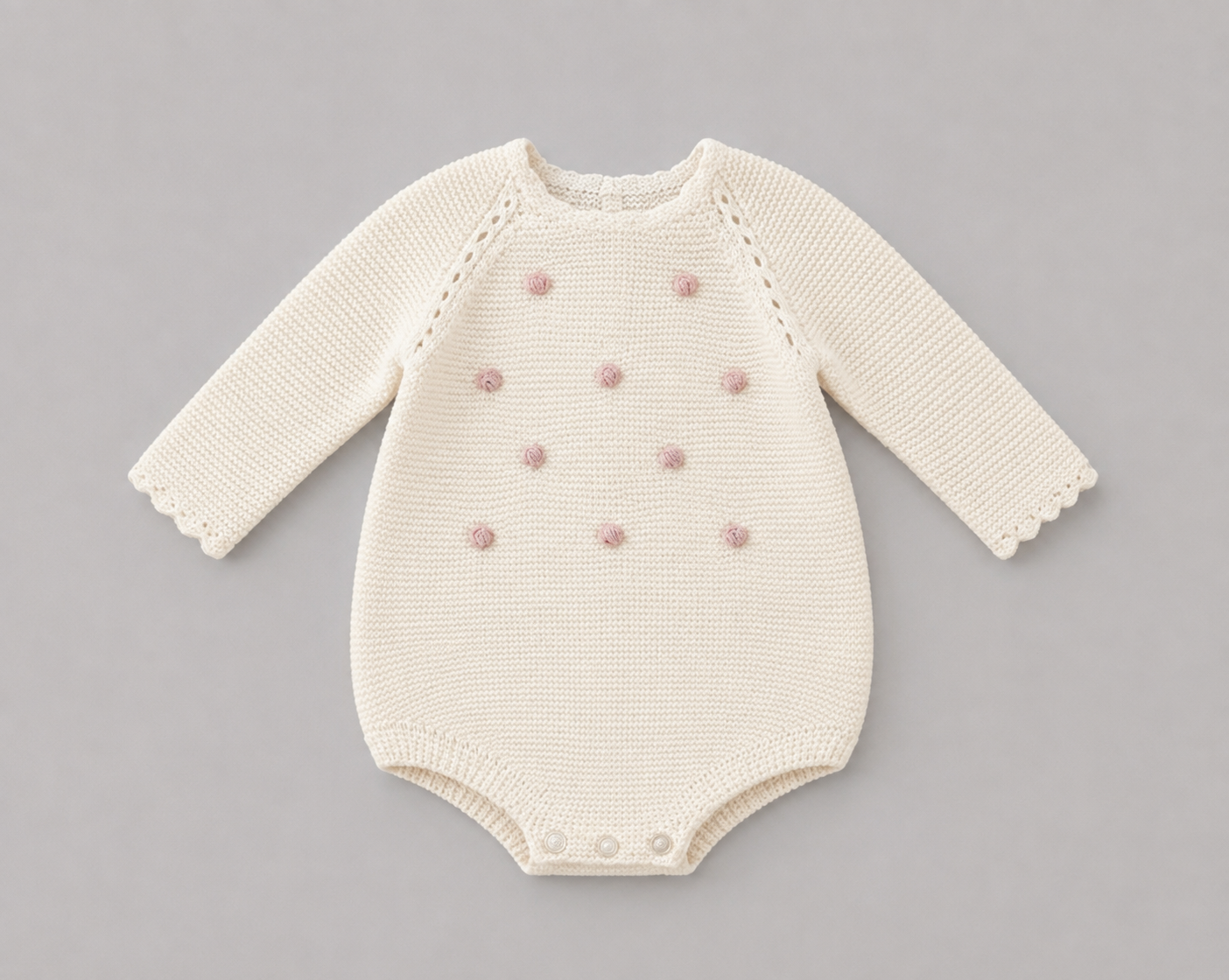 Pelele de Punto Crema con Detalles Rosa