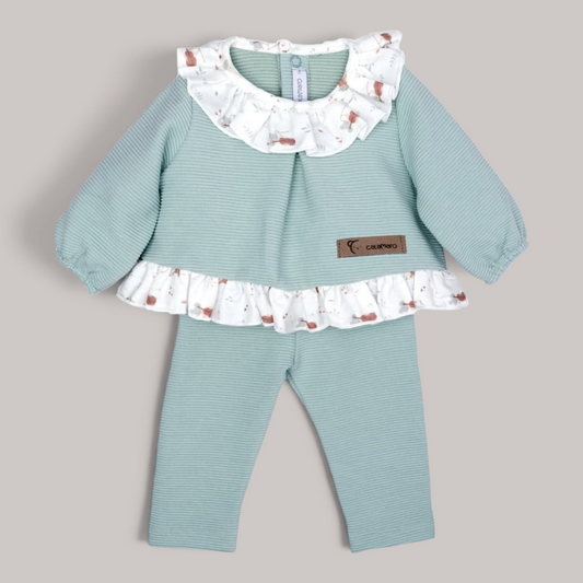 Conjunto NAVIA de blusa canalé mint con volante estampado y legging a juego para bebé