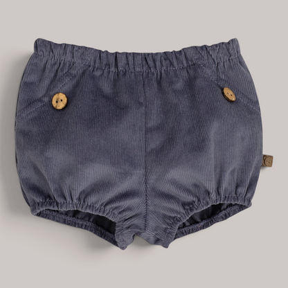 Pololo Pampero de pana gris de NAVIA con botones de madera y cintura elástica para bebé