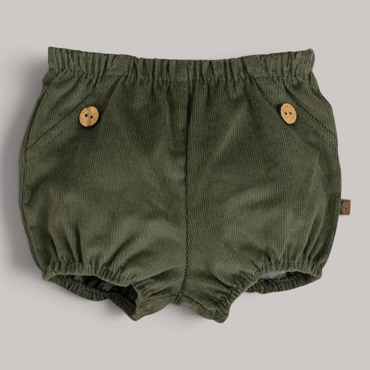 Pololo Pampero de pana verde NAVIA para bebé con botones de madera decorativos y cintura elástica cómoda